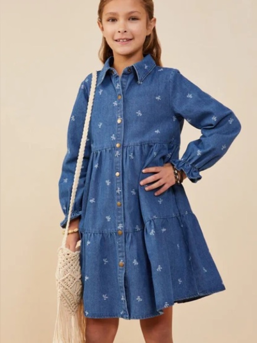 Hayden Girls Bow Print Denim Dress featuring a mid-denim wash